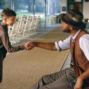 LEGEND OF BAGGER VANCE, J. Michael Moncrief, Will Smith, shaking hands.  2000