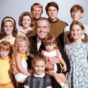 YOURS, MINE AND OURS, center: Henry Fonda; top 5 from left: Nancy Roth, Morgan Brittany (billed as Suzanne Cupito), Gil Rogers, Tim Matheson, Gary Goetzman; bottom 5 from left: Michele Tobin, Tracy Nelson, Maralee Foster, Stephanie Oliver, Holly O'Brien, 1