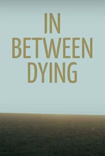 In Between Dying poster