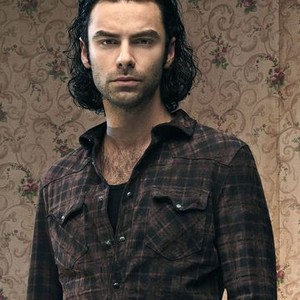 Aidan Turner as John Mitchell