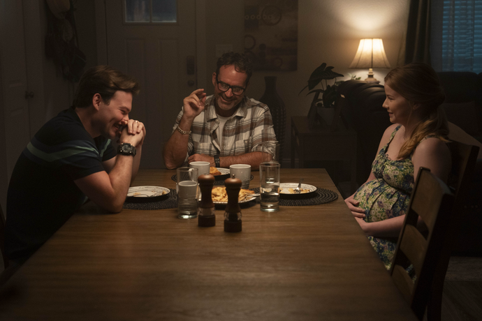 (L–R) Casey Brody (Josh Wiggens), James Brody (Jason Patric), Sara Brody (Laney Stiebing) have dinner in "Armor." (Lionsgate Films)