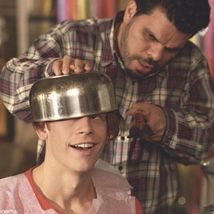 Lloyd (Eric Christian Olsen) gets his signature bowl cut by his father Ray (Luis Guzman) in New Line Cinema's upcoming comedy, Dumb and Dumberer: When Harry Met Lloyd.