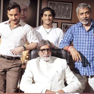 AARAKSHAN, standing l-r: Saif Ali Khan, Prateik Babbar, director Prakash Jha, seated: Amitabh Bachchan, 2011, ©Base Industries Group