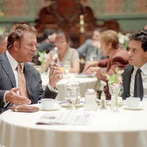 Attorney Mickey Rourke discusses legal and financial options with client and family friend Marc Anthony. photo 18