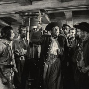 TREASURE ISLAND, Stephen Jack (second from left), Robert Newton as Long John Silver (center, holding gun), Geoffrey Keen (third from right, face in light), 1950 treasureisland1950-fsct05(treasureisland1950-fsct05)