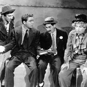 AT THE CIRCUS, from left: Chico Marx, Kenneth Laurence Baker, Groucho Marx, Harpo Marx, 1939