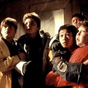 THE GOONIES, Sean Astin, Corey Feldman, Ke Huy Quan (aka Jonathan Ke Quan), Anne Ramsey (in background), Jeff Cohen, 1985, (c)Warner Bros.