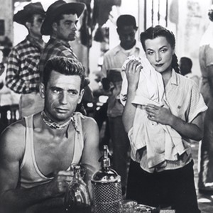 Yves Montand as Mario and Véra Clouzot as Linda in "The Wages of Fear." photo 17