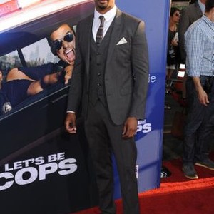 Damon Wayans Jr. at arrivals for LET'S BE COPS Premiere, The ArcLight Hollywood, Hollywood, CA August 7, 2014. Photo By: Dee Cercone/Everett Collection