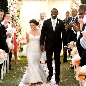 OUR FAMILY WEDDING, left in white suit: Carlos Mencia; foreground center from left: America Ferrera, Lance Gross, right with dark tie and goatee: Forest Whitaker, 2010. ph: Scott Garfield/TM & copyright ©Fox Searchlight Pictures. All rights reserved