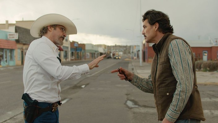 two men argue in the street in Eddington