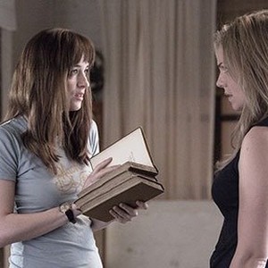 Dakota Johnson (left) as Anastasia Steele in "Fifty Shades of Grey."