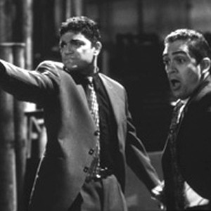 Michael DeLorenzo (left) and Jose Zuniga (right) star as mobsters Estuvio and Fidel Vaillar, respectively, in Hollywood Pictures' dark comedy Gun Shy photo 11