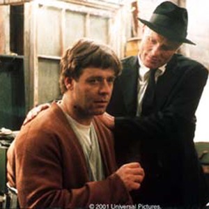 William Parcher (ED HARRIS) recruits John Nash (RUSSELL CROWE) for a top-secret defense project. photo 20