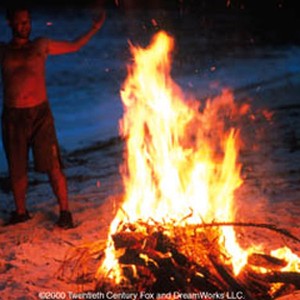 Chuck exults in the fire he has learned to create. photo 7