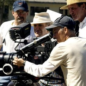 GRIDIRON GANG, Director Phil Joanou (3rd from left), on set, 2006. ©Columbia Pictures
