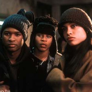 (Left to right) USHER RAYMOND, ROBERT RI'CHARD, and ROSARIO DAWSON observe the deplorable conditions in their battered inner-city school. photo 17