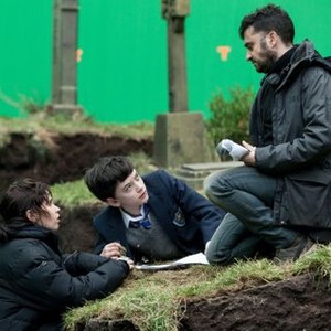 A MONSTER CALLS, from left: Felicity Jones, Lewis MacDougal, director J.A. Bayona, on set, 2016, ph: Quim Vives/© Focus Features