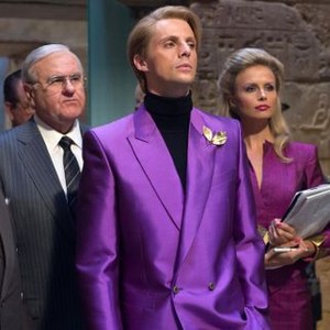 WATCHMEN, Walter Addison as Lee Iacocca (second from left), Matthew Goode (front), Sonya Salomaa (right), 2009. ©Warner Bros.