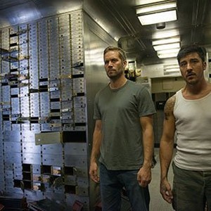 (L-R) Paul Walker as Damien and David Belle as Lino in "Brick Mansions." photo 2
