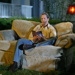 Peter (MARCUS THOMAS) relaxes with a book in BIGGER THAN THE SKY. photo 16