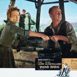 THE PROUD REBEL, front fromleft: Olivia De Havilland, Alan Ladd, David Ladd (rear), 1958