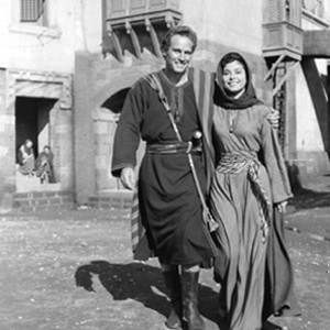 Charlton Heston (left) pictured here on the film's set in Rome with Haya Harareet (right), who played Esther.