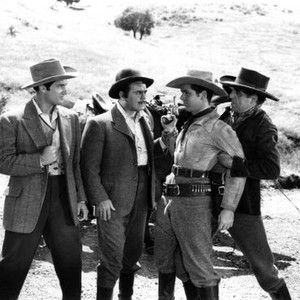 MEN OF TEXAS, from left, Robert Stack, Leo Carrillo, Jackie Cooper, Rex Lease, 1942