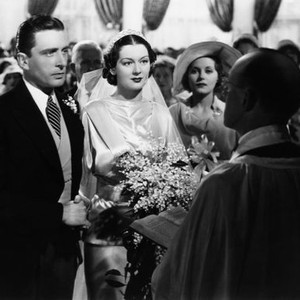 RECKLESS, from left: Leon Ames, Rosalind Russell, 1935