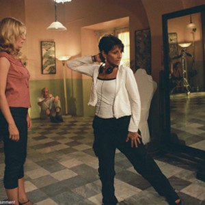 Choreographer Joann Jansen instructs Romola Garai on the set of Dirty Dancing: Havana Nights. photo 8