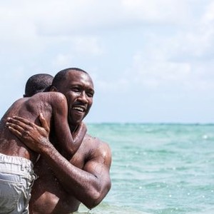 MOONLIGHT, from left: Alex R. Hibbert, Mahershala Ali, 2016. ph: David Bornfriend/© A24