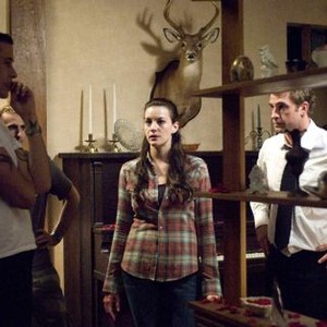 THE STRANGERS, from left: director Bryan Bertino, Liv Tyler, Scott Speedman, on set, 2008. ©Universal Pictures