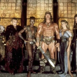 CONAN THE DESTROYER, (l-r): Tracy Walter, Mako, Grace Jones, Arnold Schwarzenegger, Olivia D'Abo, Sarah Douglas, 1984, (c)Universal