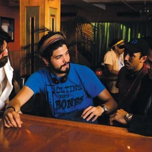 BELLA, Eduardo Verastegui (far left), director Alejandro Gomez Monteverde (second from left), Manny Perez (far right), on set, 2006. ©Roadside Attractions