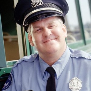 Lenny Clarke as Officer Hampton
