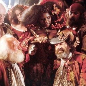 PIRATES, Ferdy Mayne (seated left), Carole Fredericks (with cleaver), Walter Matthau, (seated right), 1986, © Cannon Films