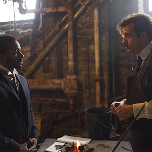 Andre Holland as Dr. Algernon Edwards and Clive Owen as Dr. John W. Thackery.