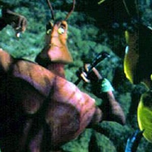Weaver (Sylvester Stallone) shows off for Azteca (Jennifer Lopez).