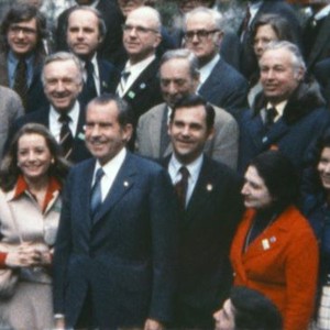 OUR NIXON, President Richard Nixon during his February 1972 trip to China, posing with reporters who accompanied him, including Dan Rather (bottom left), Barbara Walters (to Nixon's right), Walter Cronkite (directly behind Walters) and Helen Thomas (red su