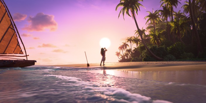 girl on beach watches setting sun in Moana 2