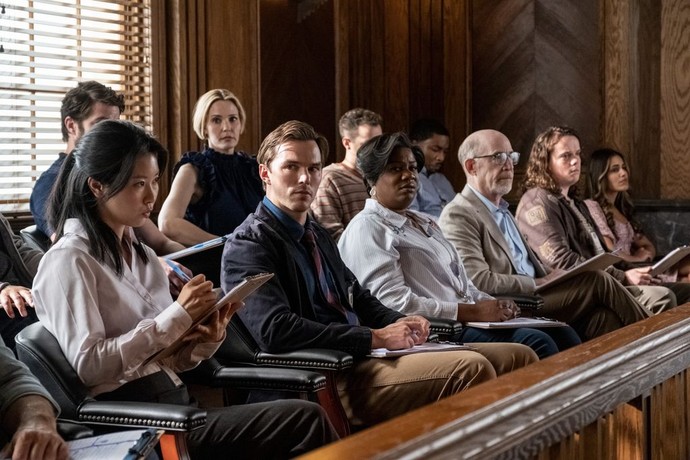 Justin Kemp (Nicholas Hoult, 2nd from left, front) is reluctantly on jury duty, in "Juror #2." (Malpaso Productions/Warner Bros. Pictures)