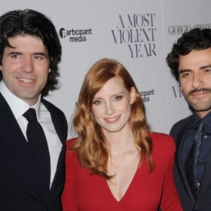 JC Chandor, Jessica Chastain, Oscar Isaac at arrivals for A MOST VIOLENT YEAR Premiere at French Institute Alliance Française, Florence Gould Hall Theater, New York, NY December 7, 2014. Photo By: Kristin Callahan/Everett Collection