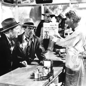 MEET JOHN DOE, foreground from left: Walter Brennan, Gary Cooper, Sterling Holloway (holding newspaper), 1941