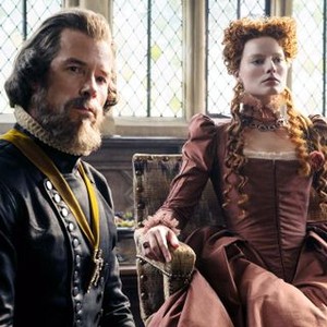 MARY QUEEN OF SCOTS, FROM LEFT: GUY PEARCE AS SIR WILLIAM CECIL, MARGOT ROBBIE AS QUEEN ELIZABETH I, 2018. PH: LIAM DANIEL. ©FOCUS FEATURES