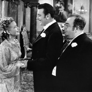 SILVER QUEEN, from left, Priscilla Lane, George Brent, Eugene Pallette, 1942
