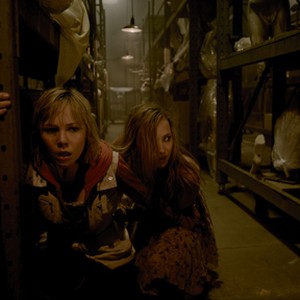 Adelaide Clemens (left) as Heather in "Silent Hill: Revelation."