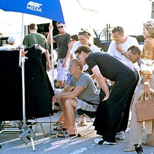 SWEPT AWAY, Director Guy Ritchie, Bruce Greenwood, Madonna watching the playback on the set, 2002, (c) Screen Gems