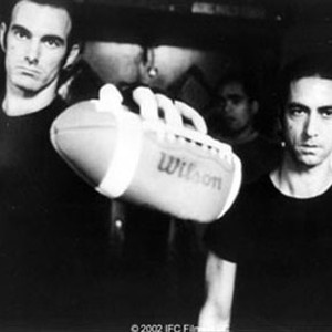 John Sayles (l) and David Strathairn (r) as intergalactic bounty hunters in THE BROTHER FROM ANOTHER PLANET. photo 9