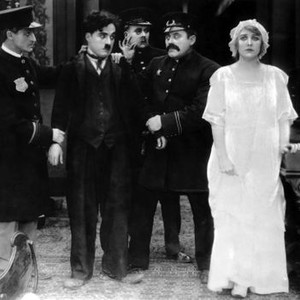 POLICE, Charlie Chaplin (second from left), Edna Purviance (far right), 1916
