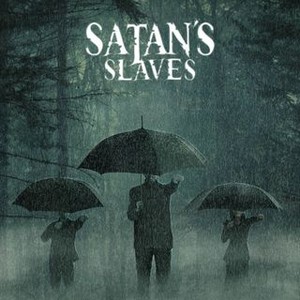 Satan's Slaves (2017) photo 1